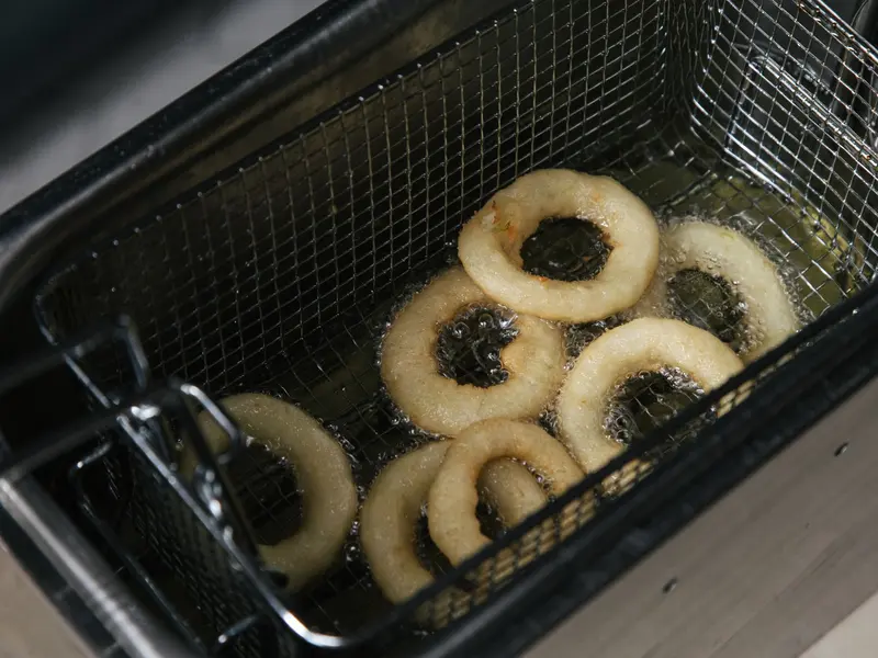 Onion rings in the fryer